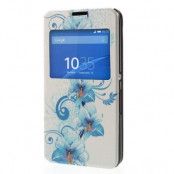 MobilFodral med fönster till Sony Xperia E4 - Blå Blommor